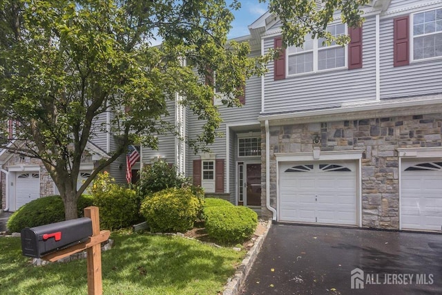 3 Rozalyn Ln, Old Bridge, NJ 08879 - multi unit property featuring stone siding, a garage, and driveway