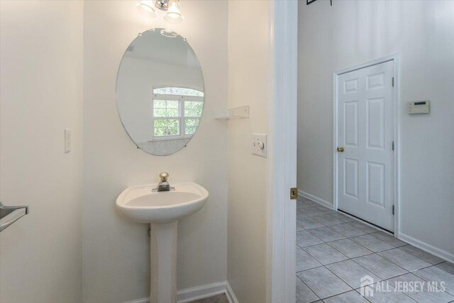 3 Rozalyn Ln, Old Bridge, NJ 08879 - bathroom featuring tile patterned flooring and baseboards
