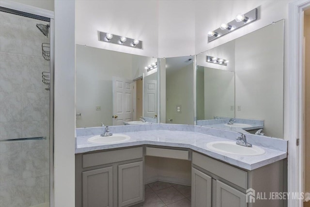3 Rozalyn Ln, Old Bridge, NJ 08879 - full bath featuring tile patterned flooring, double vanity, and a tile shower