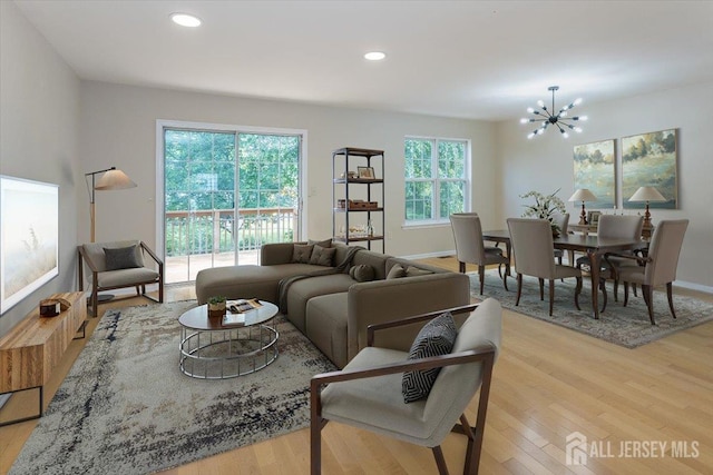 3 Rozalyn Ln, Old Bridge, NJ 08879 - living room featuring light wood finished floors, a chandelier, and recessed lighting