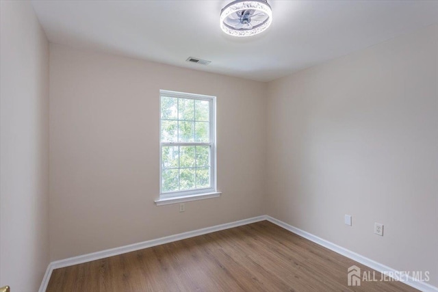 3 Rozalyn Ln, Old Bridge, NJ 08879 - spare room featuring wood finished floors and baseboards