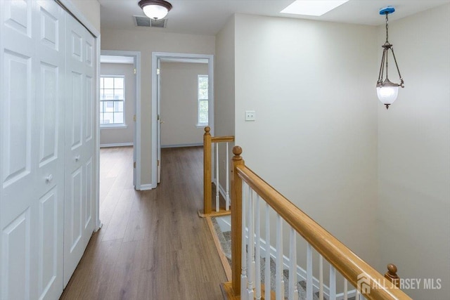 3 Rozalyn Ln, Old Bridge, NJ 08879 - hall with an upstairs landing, wood finished floors, and a skylight