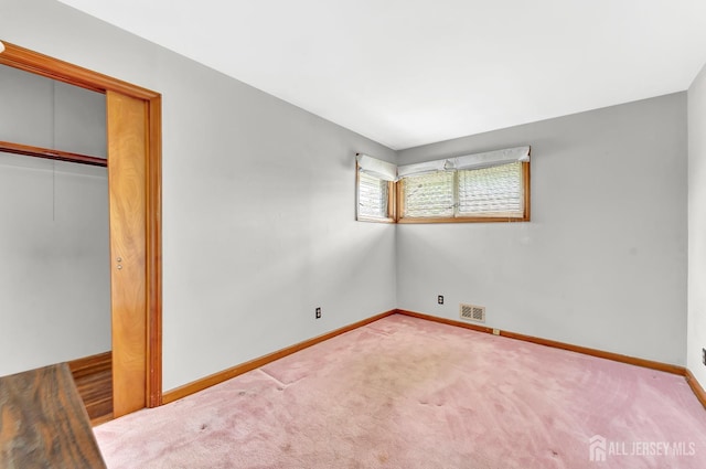 77 Manhattan Ave, Avenel, NJ 07001 - unfurnished bedroom featuring carpet and a closet