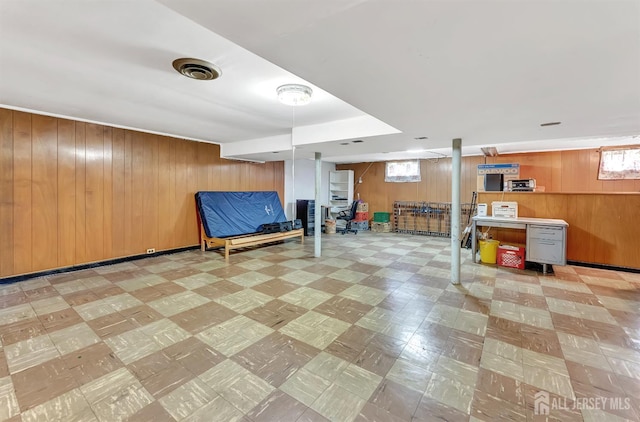 77 Manhattan Ave, Avenel, NJ 07001 - below grade area featuring tile patterned floors and wood walls