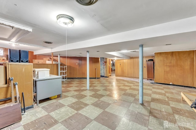 77 Manhattan Ave, Avenel, NJ 07001 - finished below grade area with light flooring, wooden walls, and refrigerator
