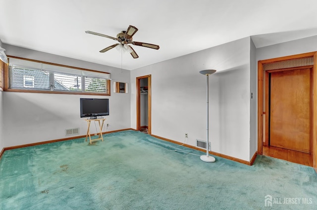 77 Manhattan Ave, Avenel, NJ 07001 - unfurnished living room with carpet and a ceiling fan