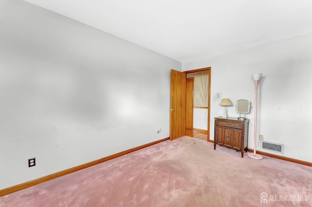 77 Manhattan Ave, Avenel, NJ 07001 - carpeted spare room featuring baseboards