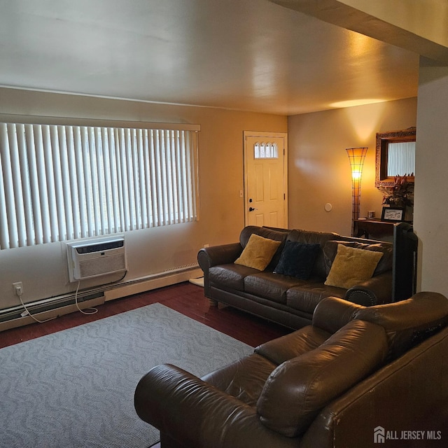 living room featuring dark wood-type flooring and a wall unit AC