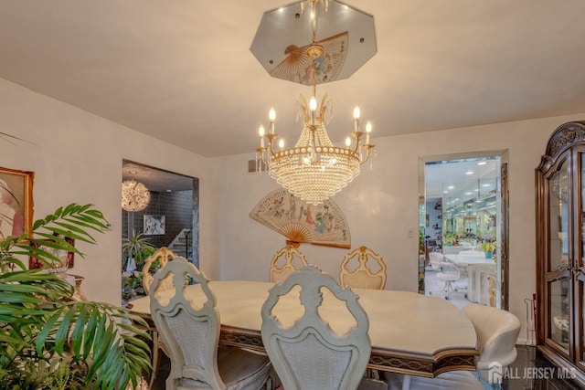 dining room with a chandelier