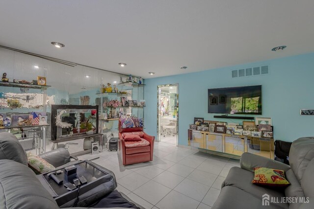 living room featuring light tile patterned floors