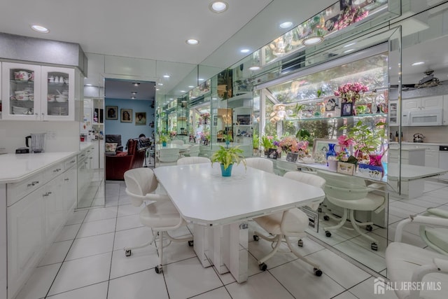 dining area featuring recessed lighting