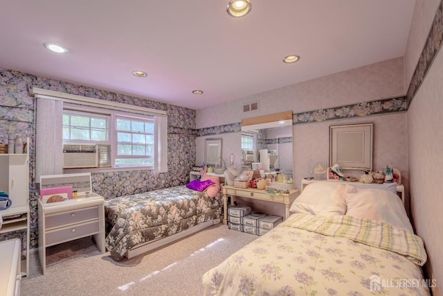 bedroom with carpet, recessed lighting, cooling unit, and wallpapered walls