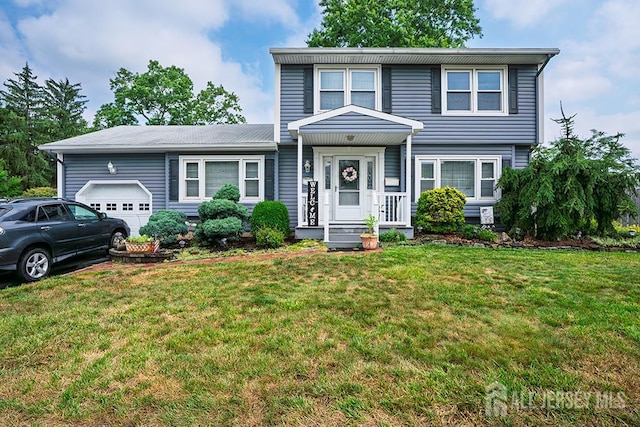 32 Dogwood Dr, Middlesex, NJ 08846 - view of front of property featuring a garage and a front lawn