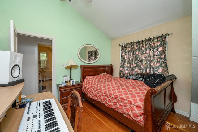 570 Main St, Metuchen, NJ 08840 - bedroom with vaulted ceiling and wood finished floors