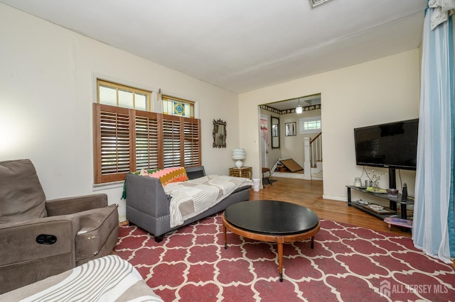 570 Main St, Metuchen, NJ 08840 - living area featuring wood finished floors and stairs