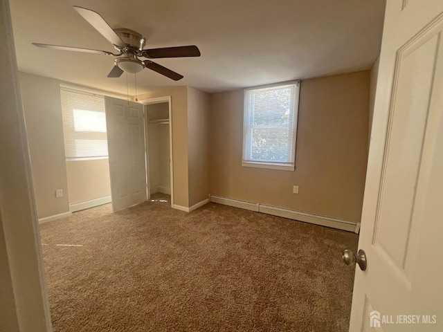 865 Kreil St, Perth Amboy, NJ 08861 - unfurnished bedroom featuring a baseboard radiator, carpet flooring, baseboards, ceiling fan, and a closet