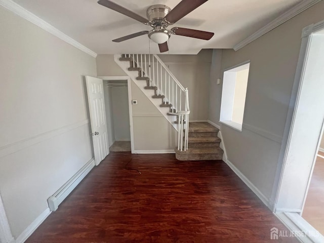 865 Kreil St, Perth Amboy, NJ 08861 - interior space featuring a baseboard heating unit, a ceiling fan, wood finished floors, ornamental molding, and baseboards