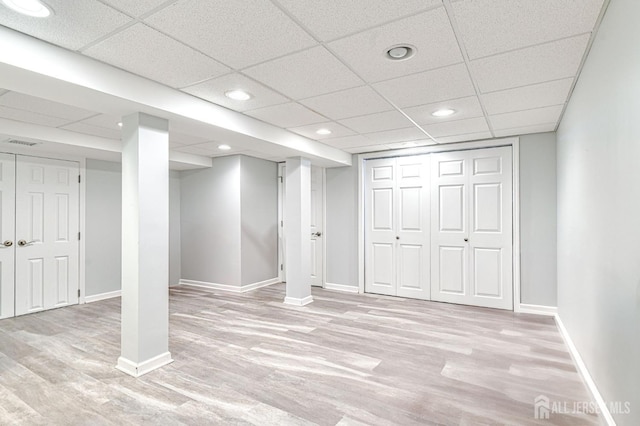 16 Jeanette Ct Unit 293, Jamesburg, NJ 08831 - finished below grade area with light wood finished floors, recessed lighting, and a paneled ceiling
