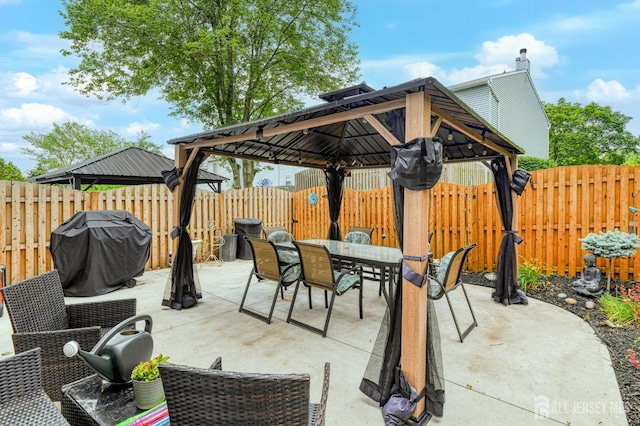 16 Jeanette Ct Unit 293, Jamesburg, NJ 08831 - fenced backyard featuring a gazebo, outdoor dining space, area for grilling, and a patio