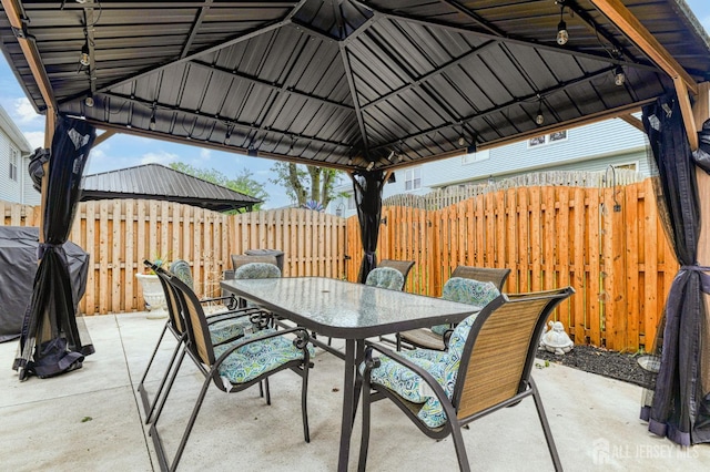 16 Jeanette Ct Unit 293, Jamesburg, NJ 08831 - fenced backyard with outdoor dining space, a patio area, a gazebo, and grilling area