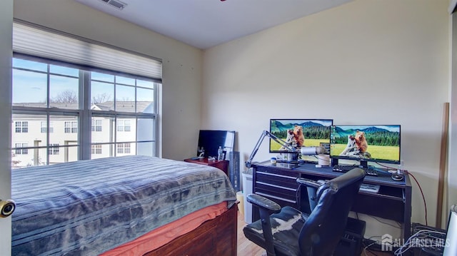 bedroom featuring hardwood / wood-style floors