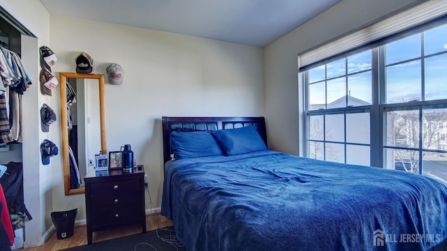 bedroom featuring hardwood / wood-style flooring