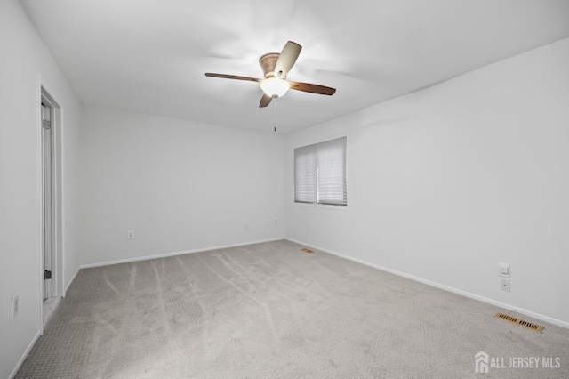 70 Lexington Cir, Old Bridge, NJ 07747 - carpeted empty room with a ceiling fan and baseboards