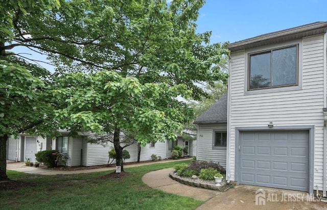 70 Lexington Cir, Old Bridge, NJ 07747 - view of front of home featuring an attached garage