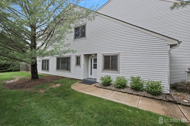 70 Lexington Cir, Old Bridge, NJ 07747 - rear view of property with a yard