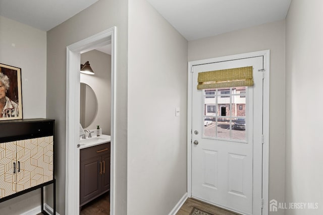 3 Wood Acres Dr, North Brunswick, NJ 08902 - doorway to outside with dark wood finished floors and baseboards