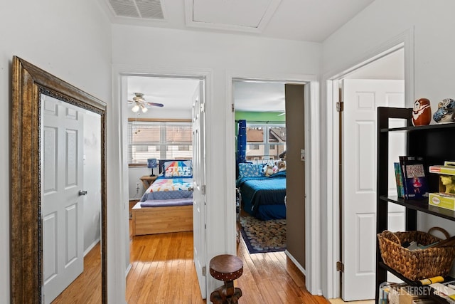 hall featuring light hardwood / wood-style flooring