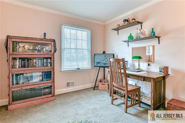 carpeted office featuring visible vents, baseboards, and ornamental molding