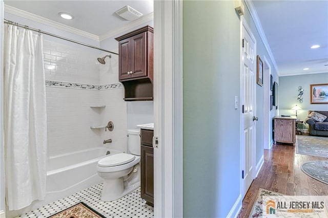 bathroom with visible vents, toilet, shower / bath combo, ornamental molding, and vanity