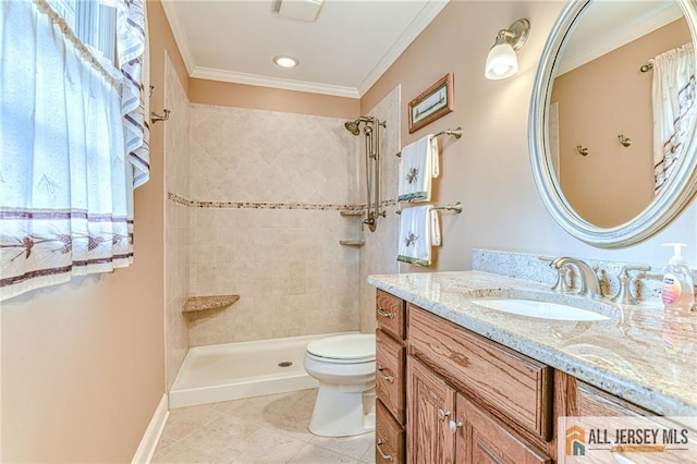 bathroom with tile patterned floors, a tile shower, toilet, and crown molding