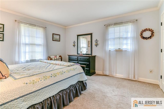 bedroom featuring baseboards, light carpet, and crown molding