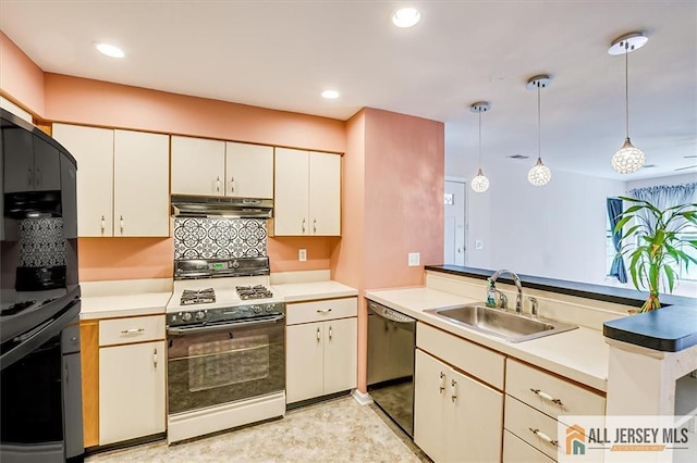331 Cozzens Ct Unit 331, East Brunswick, NJ 08816 - kitchen featuring gas range gas stove, fridge, dishwasher, under cabinet range hood, and a peninsula