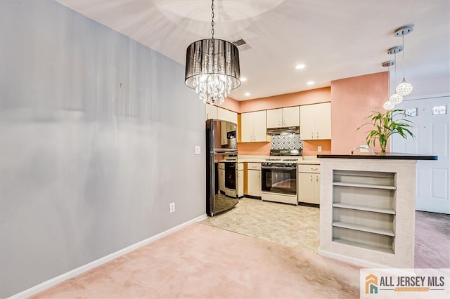 331 Cozzens Ct Unit 331, East Brunswick, NJ 08816 - kitchen featuring range with gas cooktop, freestanding refrigerator, under cabinet range hood, a chandelier, and light colored carpet