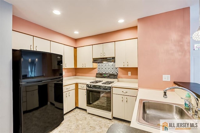 331 Cozzens Ct Unit 331, East Brunswick, NJ 08816 - kitchen featuring gas stove, under cabinet range hood, freestanding refrigerator, light countertops, and dishwasher