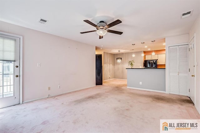 331 Cozzens Ct Unit 331, East Brunswick, NJ 08816 - unfurnished living room featuring light colored carpet, ceiling fan, and recessed lighting
