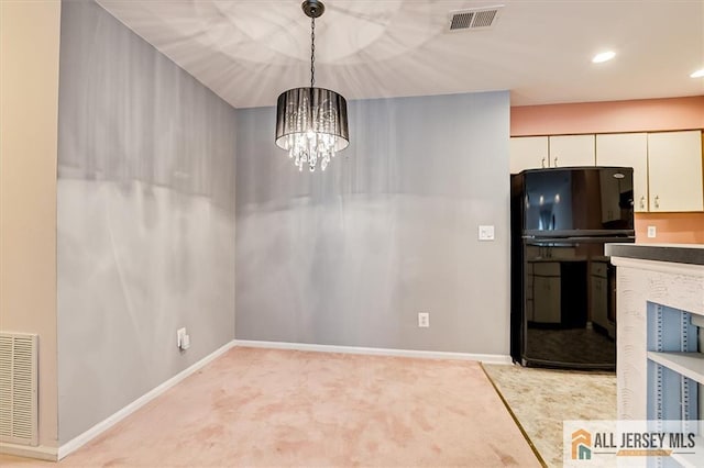 331 Cozzens Ct Unit 331, East Brunswick, NJ 08816 - unfurnished dining area featuring light colored carpet, a chandelier, and recessed lighting