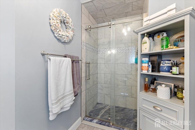full bathroom featuring a stall shower
