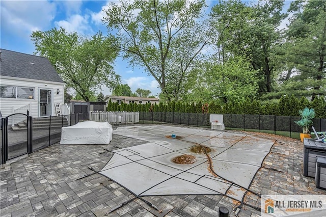 10 Buttonwood Dr, Old Bridge, NJ 08857 - fenced backyard featuring a patio area