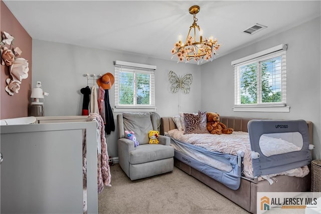 10 Buttonwood Dr, Old Bridge, NJ 08857 - carpeted bedroom featuring multiple windows and a chandelier