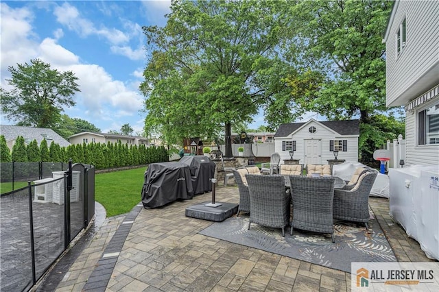 10 Buttonwood Dr, Old Bridge, NJ 08857 - view of patio / terrace featuring outdoor dining area and an outdoor structure