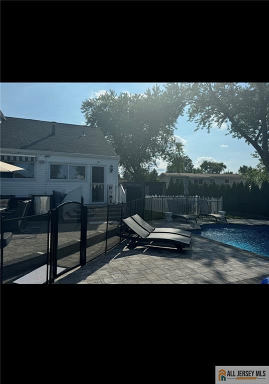 10 Buttonwood Dr, Old Bridge, NJ 08857 - deck featuring a patio