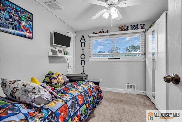 10 Buttonwood Dr, Old Bridge, NJ 08857 - carpeted bedroom with ceiling fan and baseboards