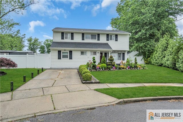 10 Buttonwood Dr, Old Bridge, NJ 08857 - traditional-style house with driveway