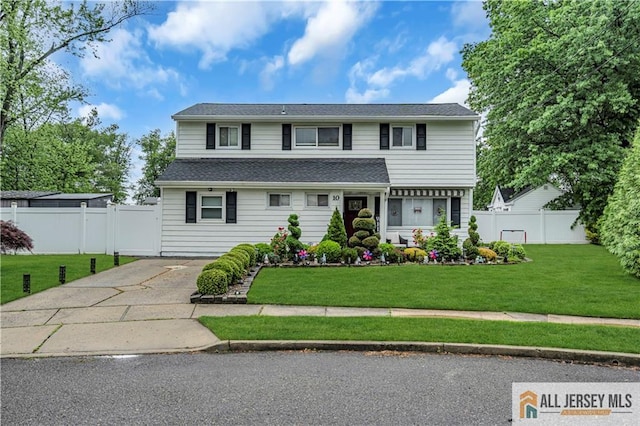 10 Buttonwood Dr, Old Bridge, NJ 08857 - traditional-style house with concrete driveway