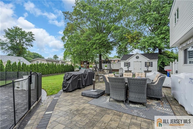 10 Buttonwood Dr, Old Bridge, NJ 08857 - view of patio / terrace featuring outdoor dining space, an outdoor structure, and area for grilling