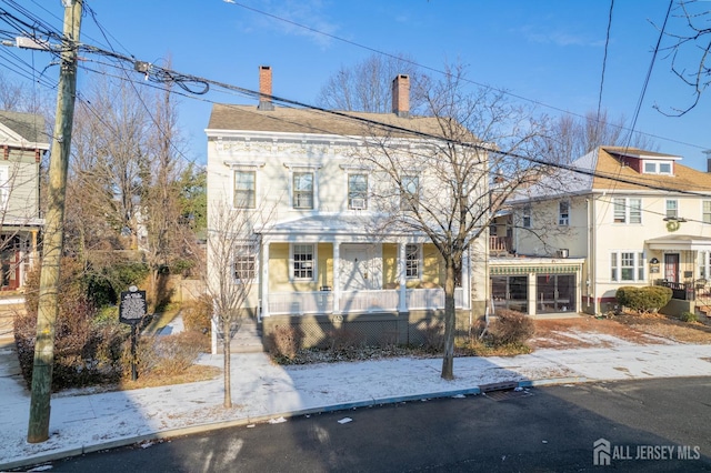 view of front of home featuring covered porch